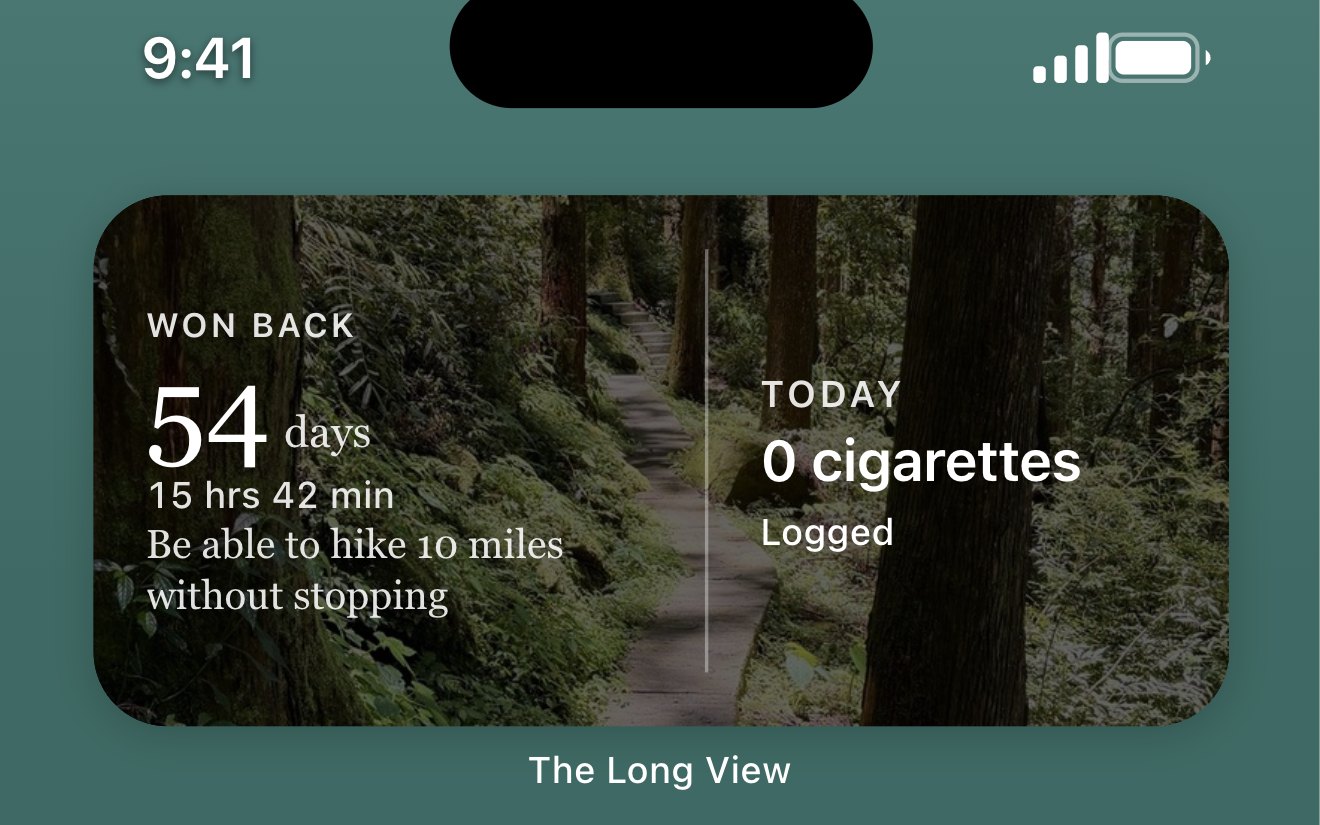 The medium widget on an iPhone home screen: 54 days and 15 hours won back, set over the photo of the reason for quitting, beside today's count of zero cigarettes, logged.